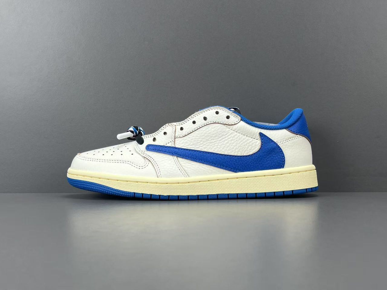 Fragment x Travis Scott x Air Jordan 1 Low OG SP Sail Military Blue.