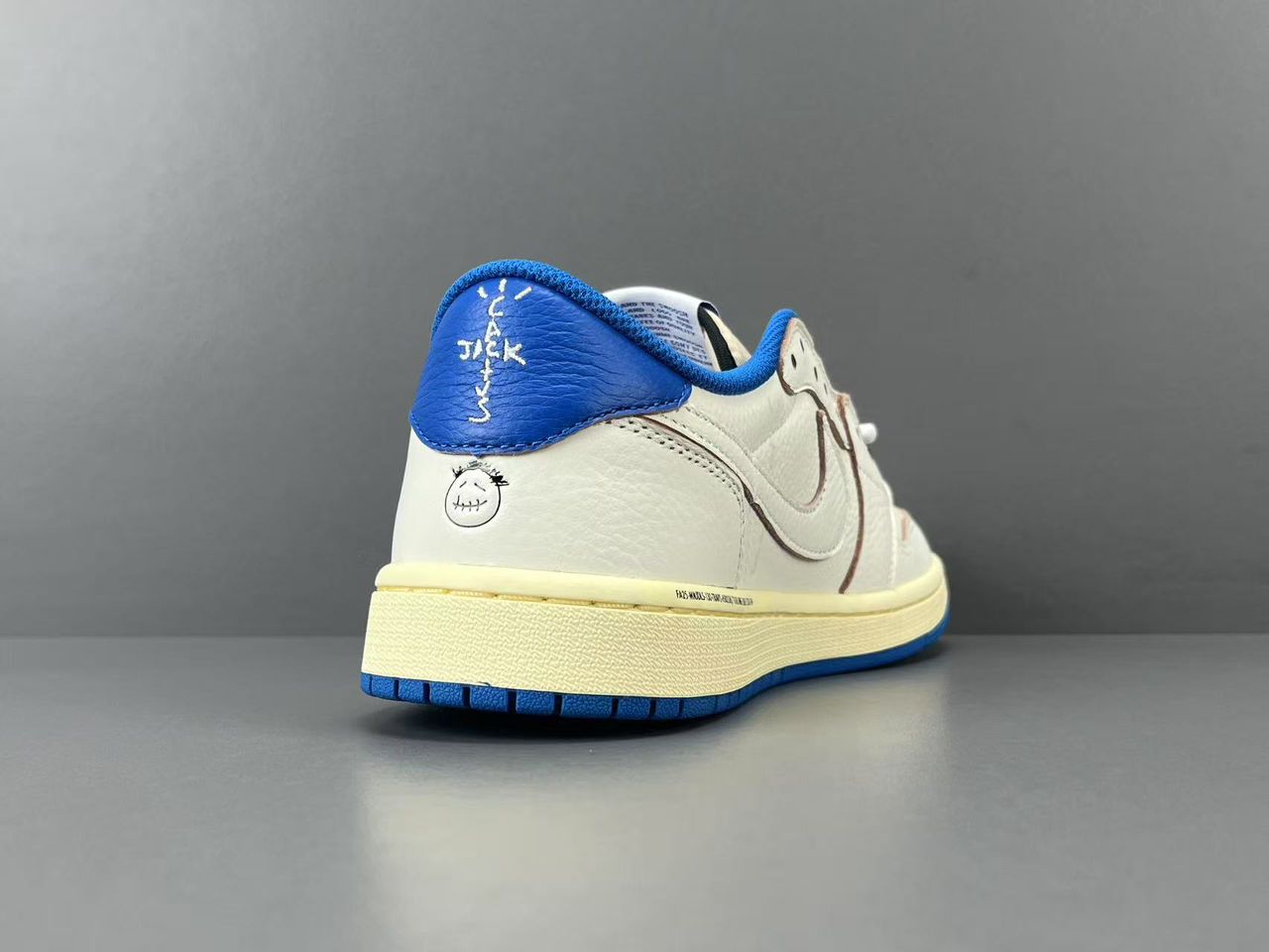 Fragment x Travis Scott x Air Jordan 1 Low OG SP Sail Military Blue.