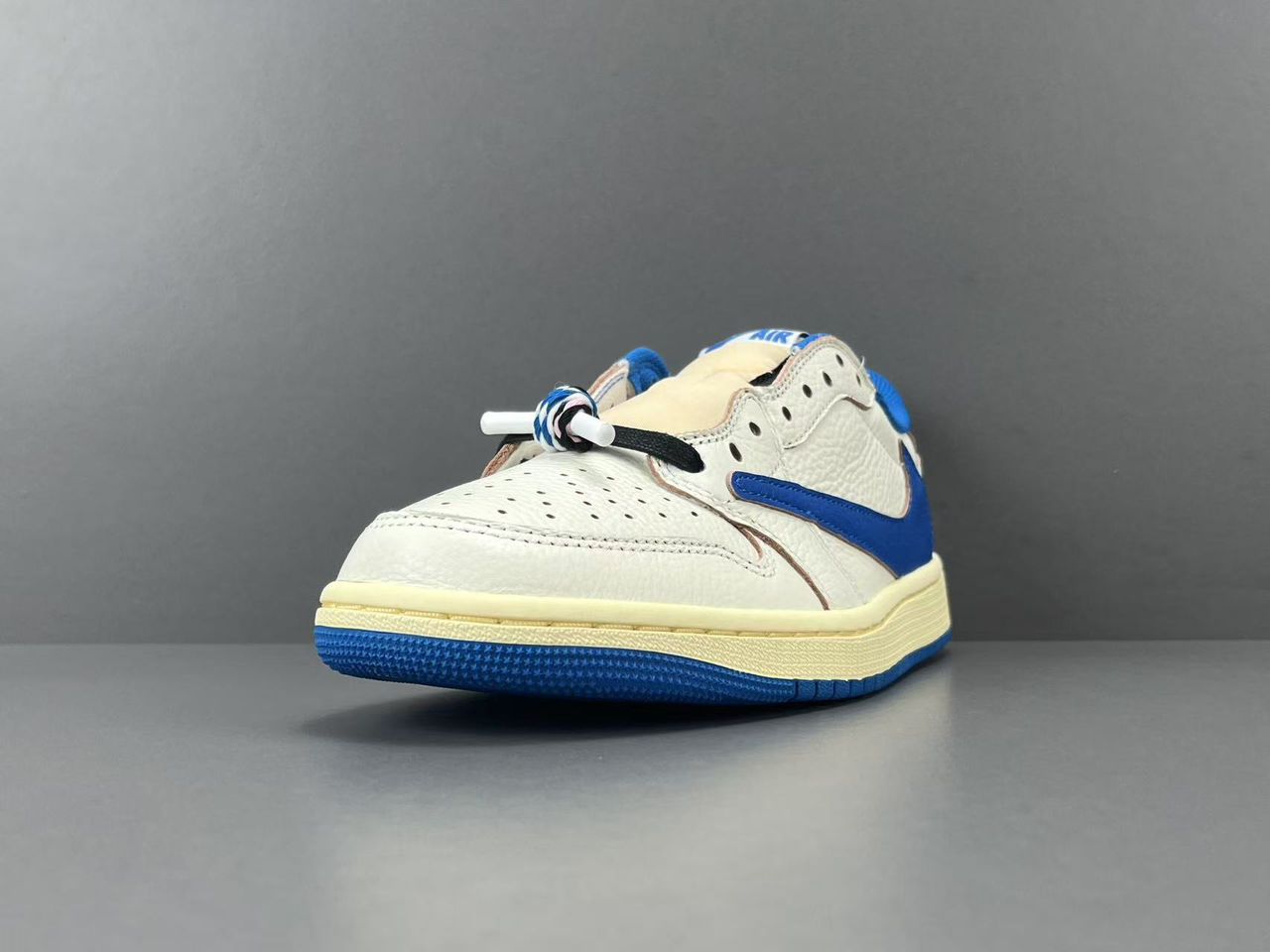 Fragment x Travis Scott x Air Jordan 1 Low OG SP Sail Military Blue.